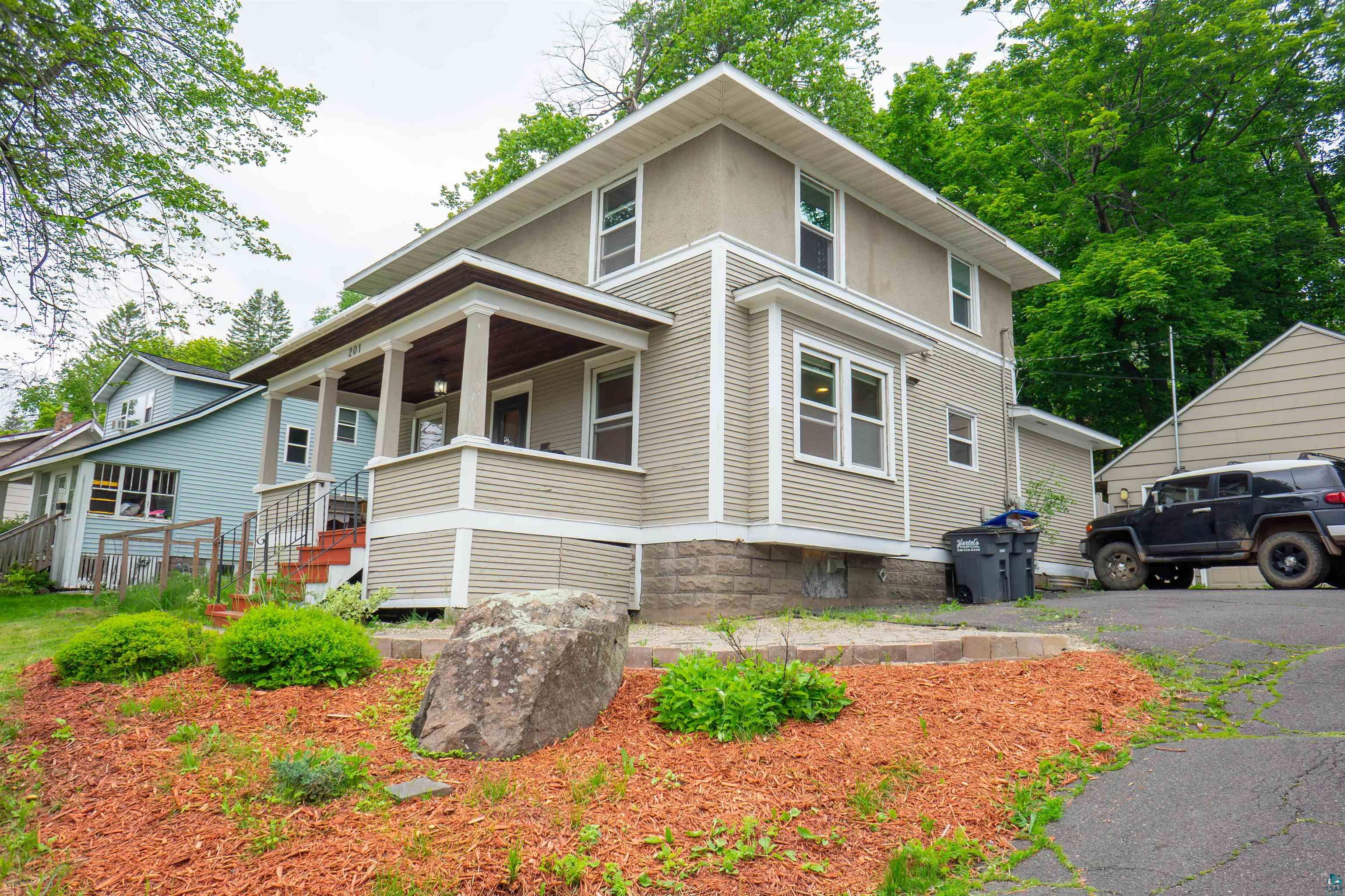201 Snively Road Duluth, MN 55803 - Photo 2 of 21 View of front of property featuring a porch