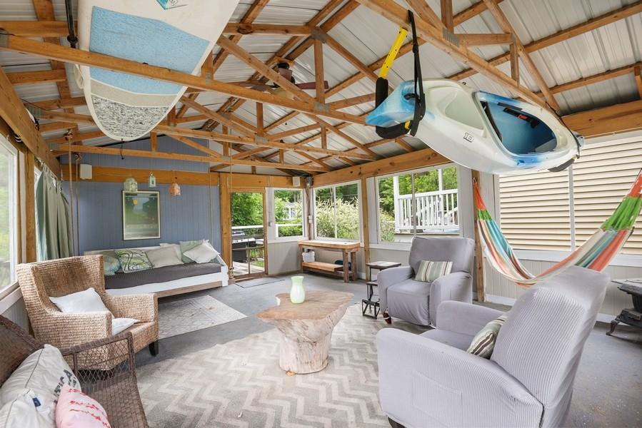 6261 Harding Street Coloma, MI 49038 - Photo 16 of 20 Inside porch...it's movie time!