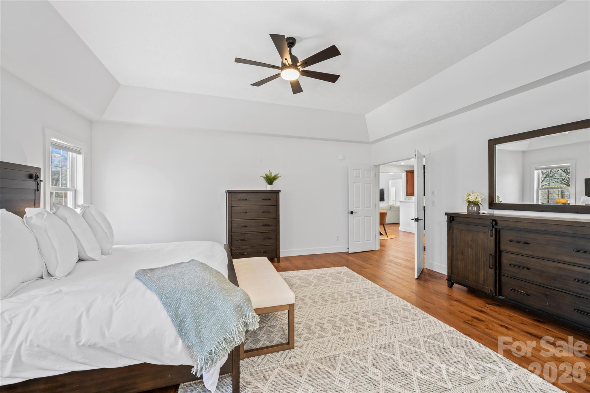 719 Neely Road Brevard, NC 28712 - Photo 13 of 33 a bedroom with a bed and a dresser