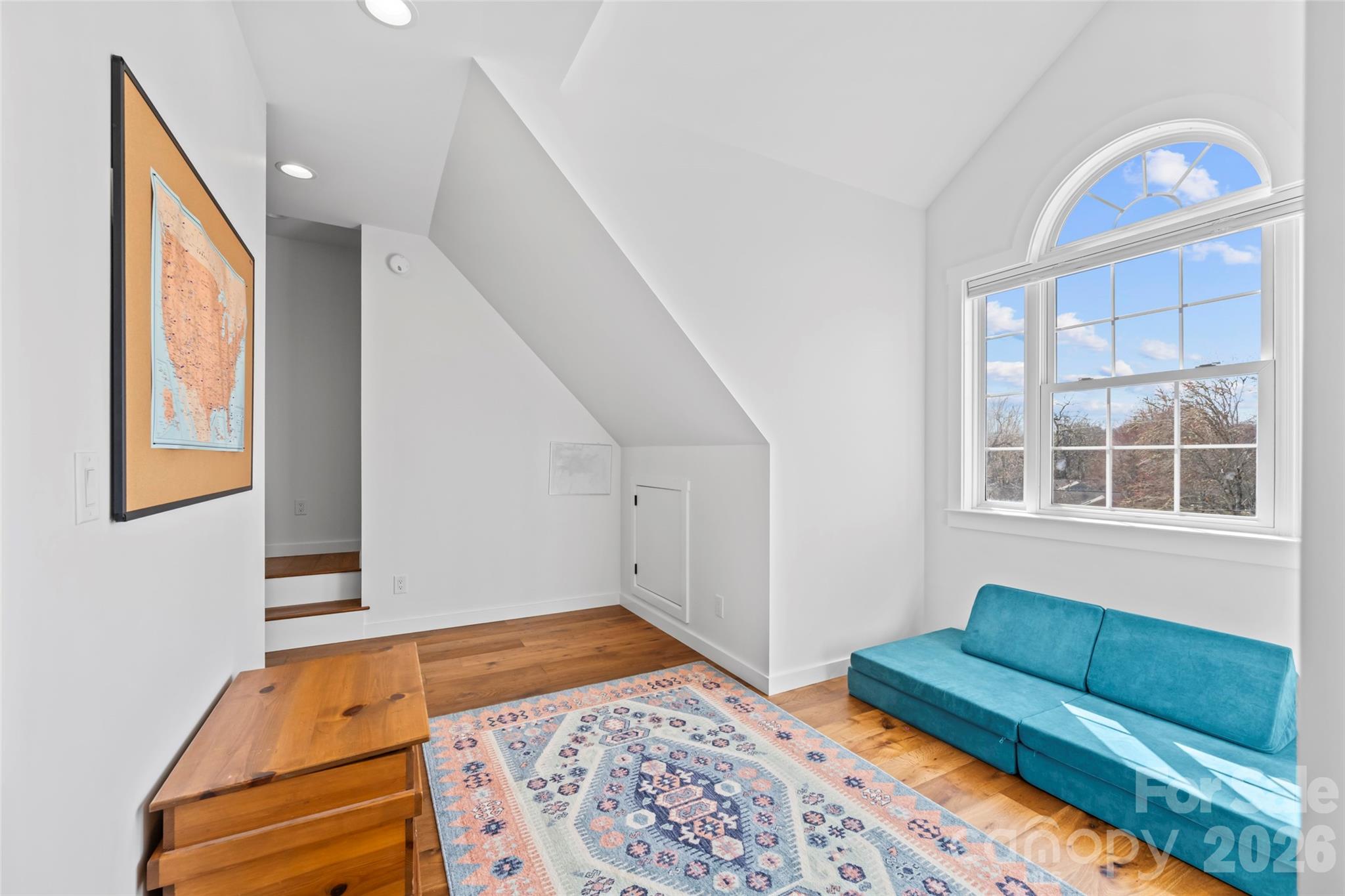 719 Neely Road Brevard, NC 28712 - Photo 17 of 33 a bedroom with furniture and a window