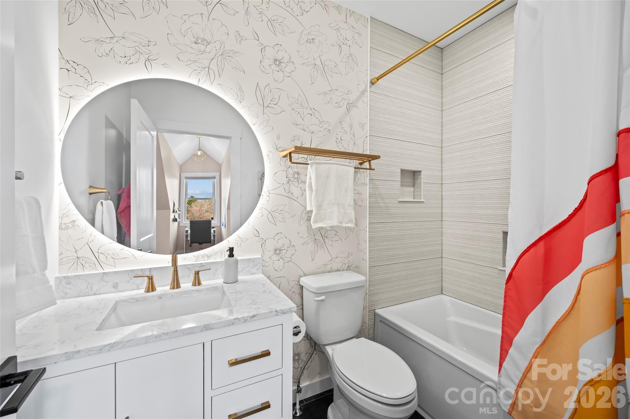 719 Neely Road Brevard, NC 28712 - Photo 20 of 33 a bathroom with a sink and mirror with toilet