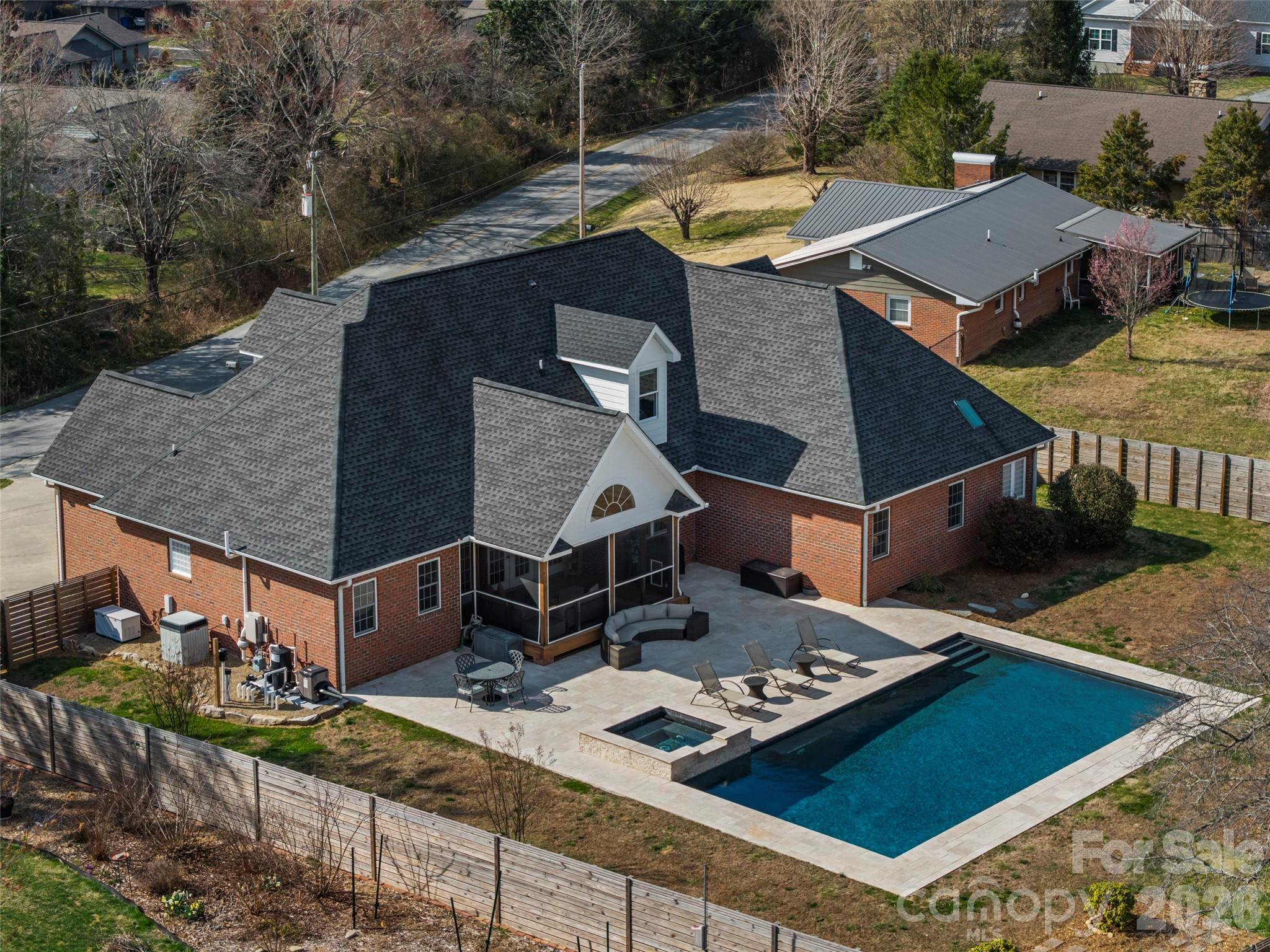 719 Neely Road Brevard, NC 28712 - Photo 2 of 33 an aerial view of a house with swimming pool