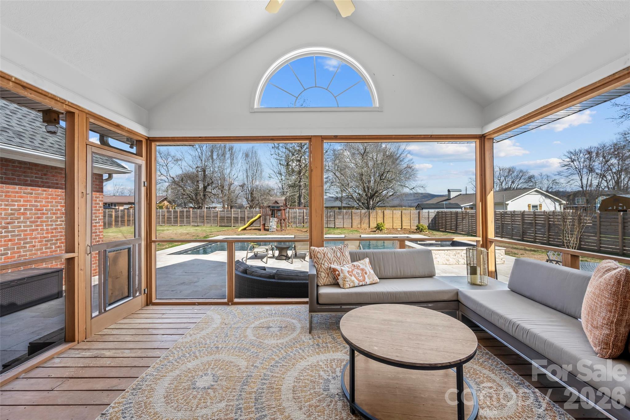 719 Neely Road Brevard, NC 28712 - Photo 23 of 33 a living room with furniture and a large window