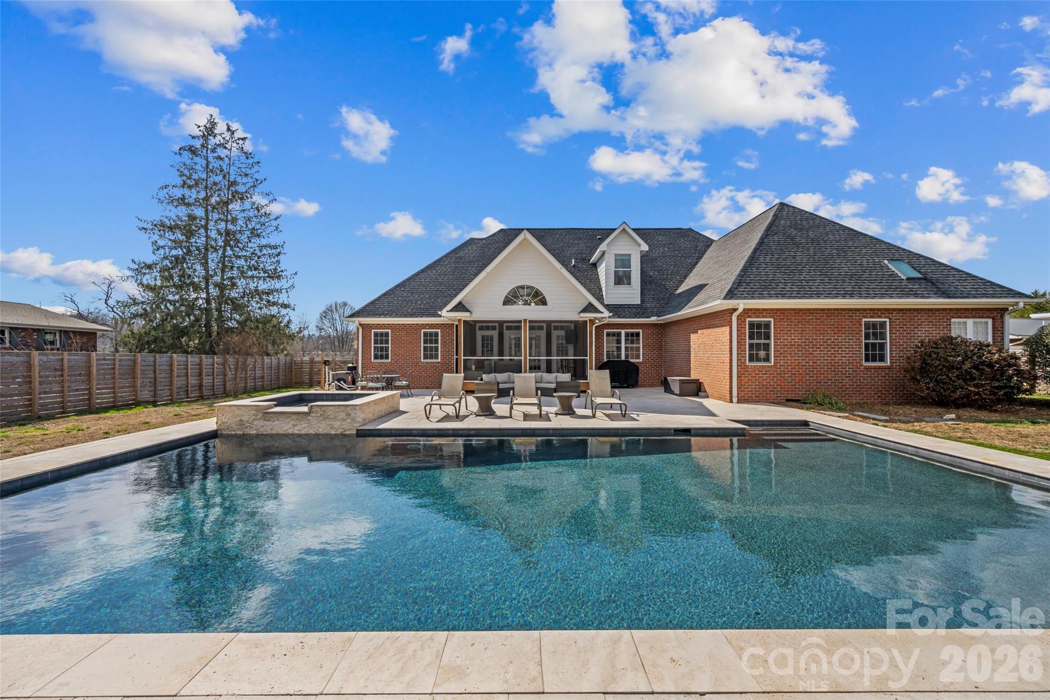 719 Neely Road Brevard, NC 28712 - Photo 26 of 33 a view of a house with swimming pool and a yard
