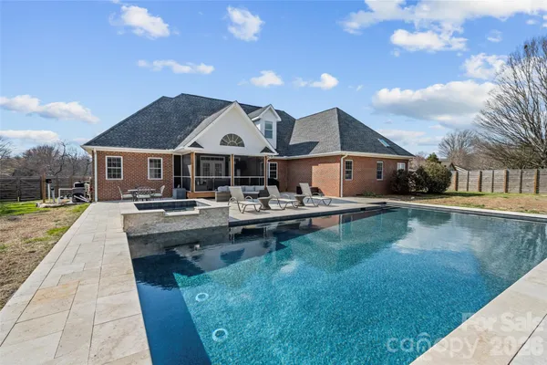 a view of house with outdoor space