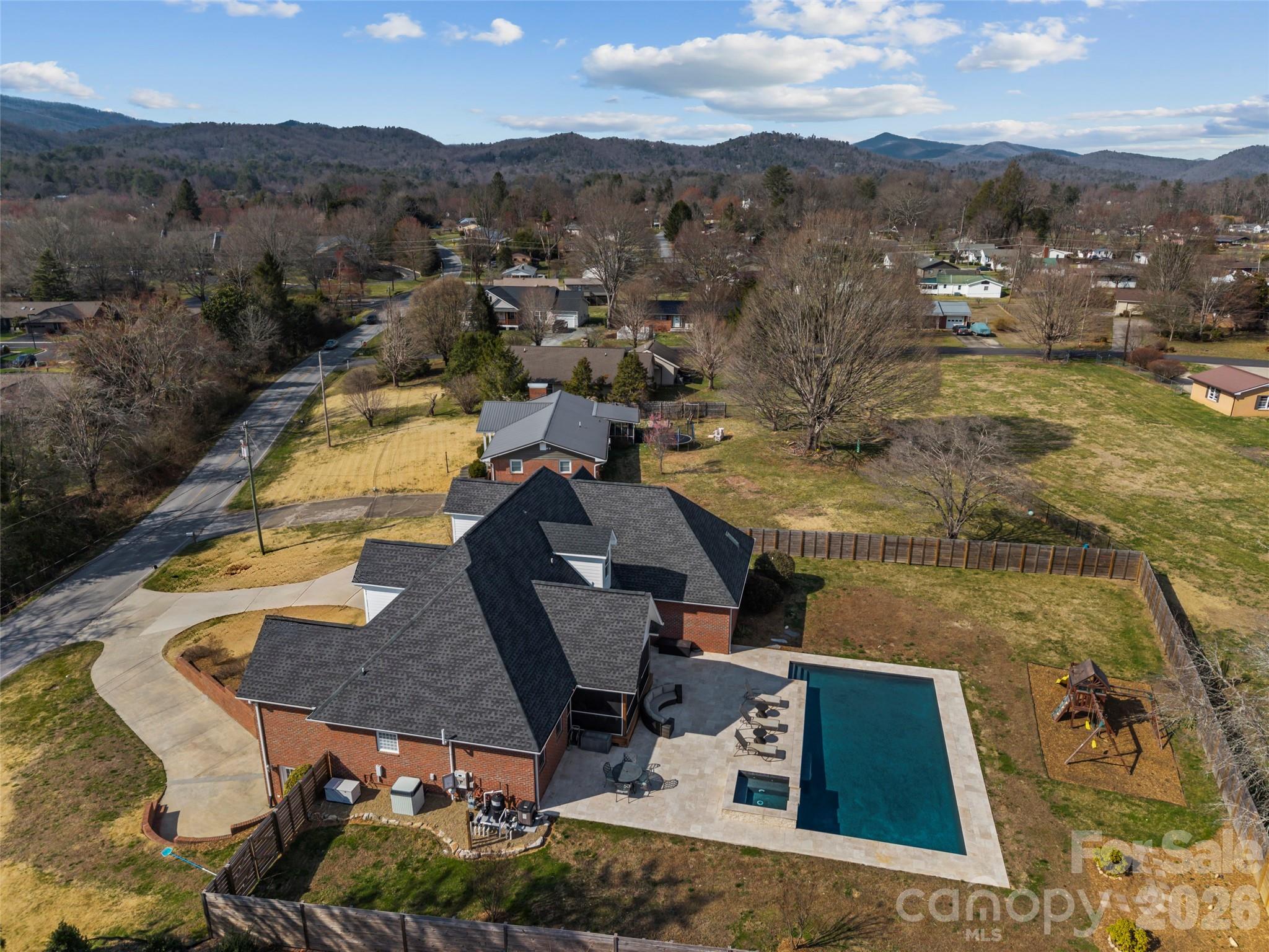 719 Neely Road Brevard, NC 28712 - Photo 31 of 33 an aerial view of residential houses with outdoor space