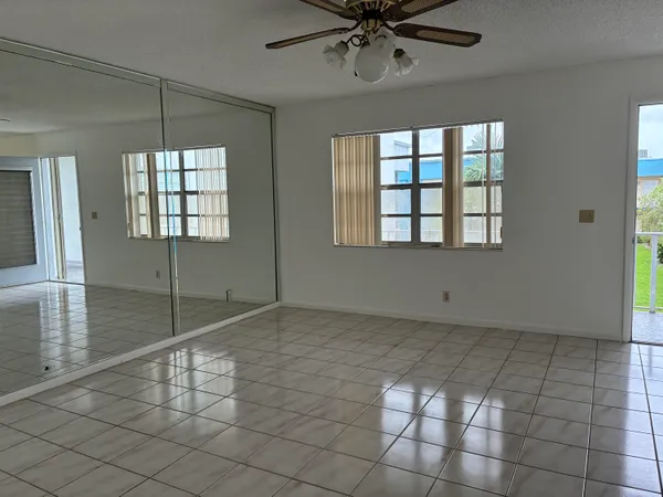 a view of an empty room and window