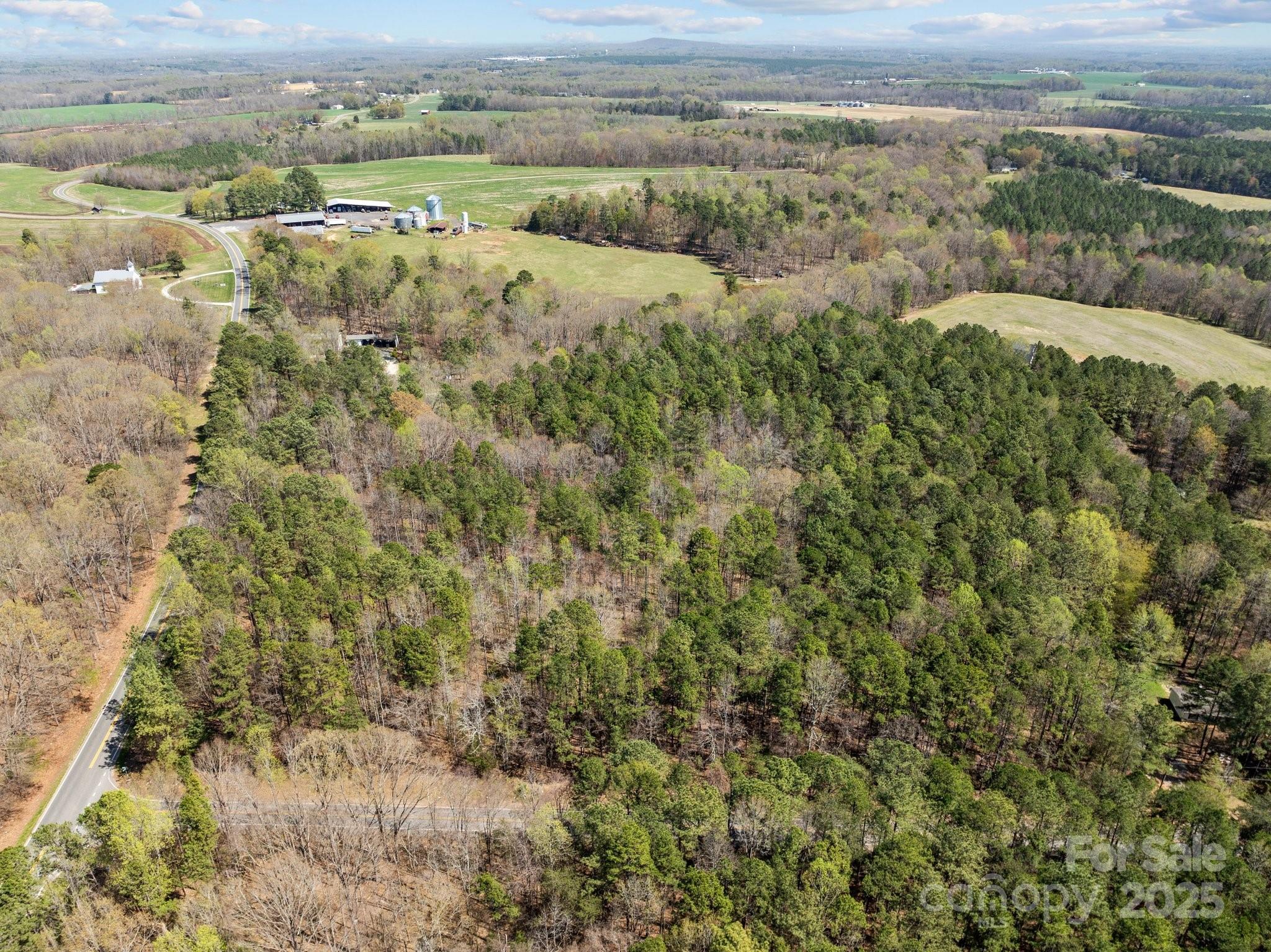 ### Umberger Road Cleveland, NC 27013 - Photo 4 of 9 an aerial view of mountains with green space