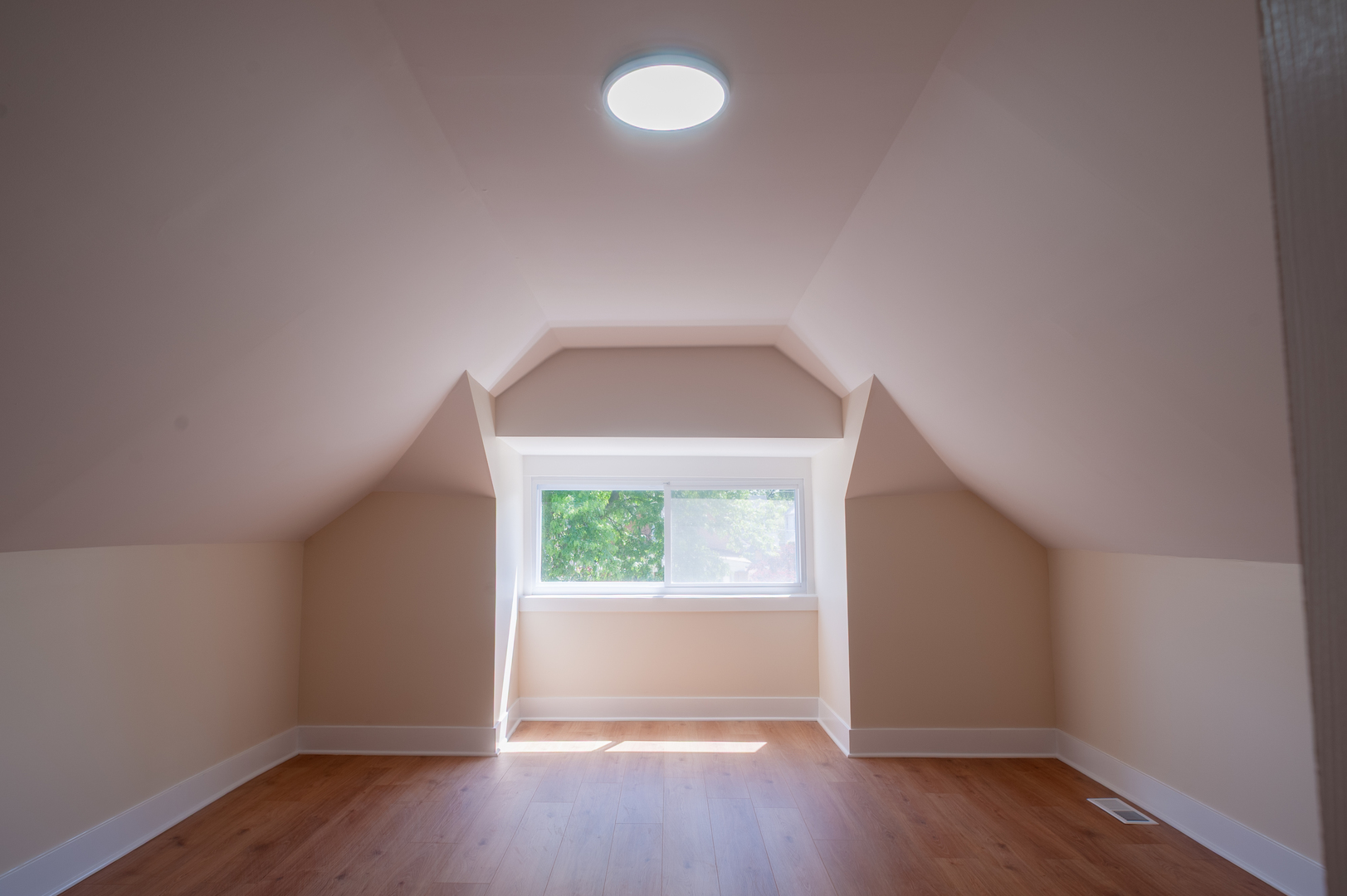 8620 South Union Avenue Chicago, IL 60620 - Photo 36 of 41 an empty room with wooden floor and windows
