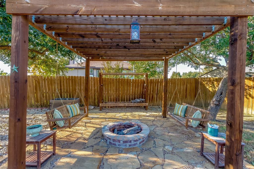 226 King George Road Ponder, TX 76259 - Photo 12 of 39 View of patio / terrace featuring a pergola and an outdoor fire pit