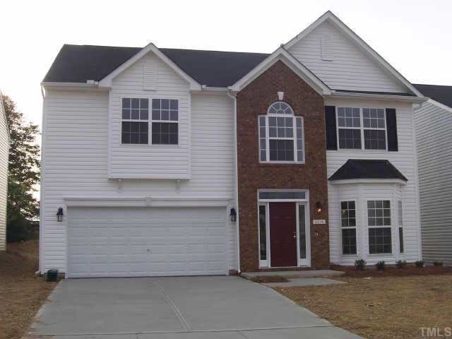4319 Karlbrook Lane Raleigh, NC 27616 - Photo 1 of 1 a front view of a house with a yard