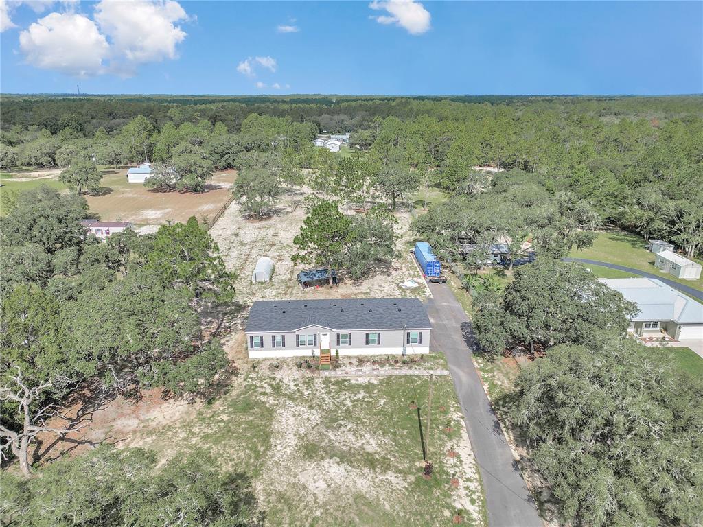 5190 Southwest 178th Terrace Dunnellon, FL 34432 - Photo 3 of 51 a view of an outdoor space and a yard