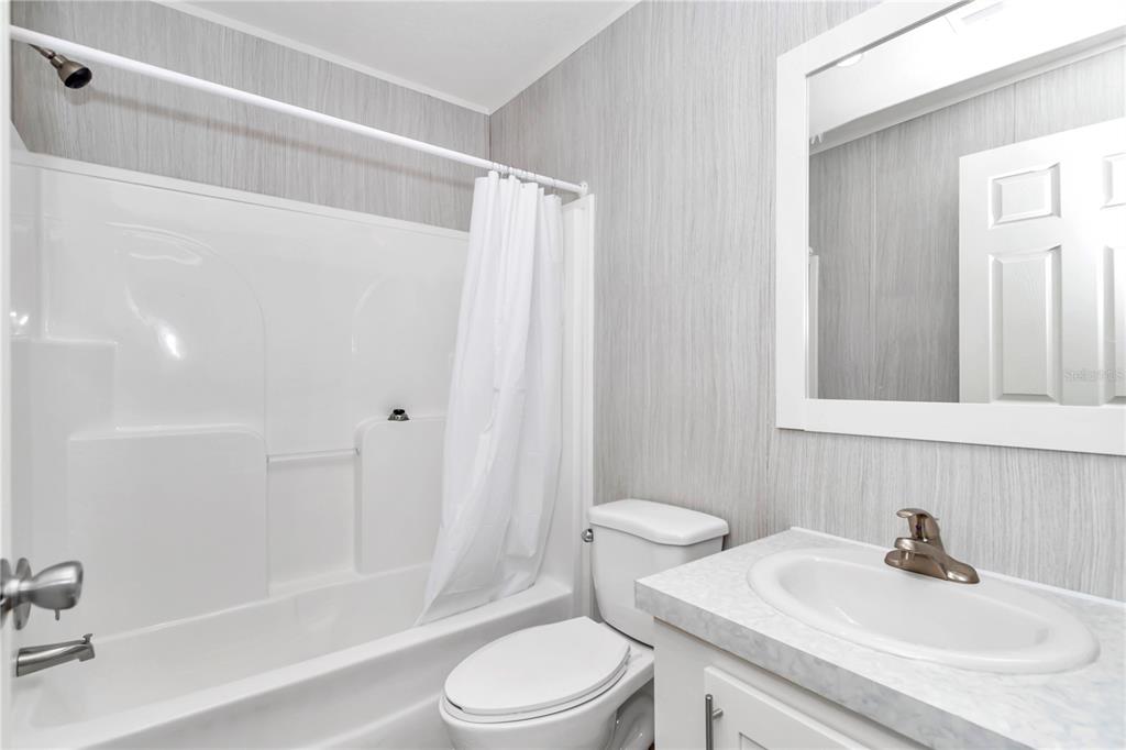 5190 Southwest 178th Terrace Dunnellon, FL 34432 - Photo 33 of 51 a bathroom with a sink toilet and shower