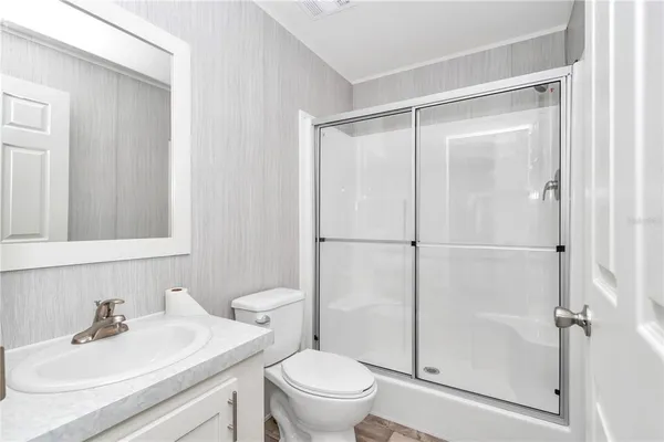 a view of a room that has a window in it