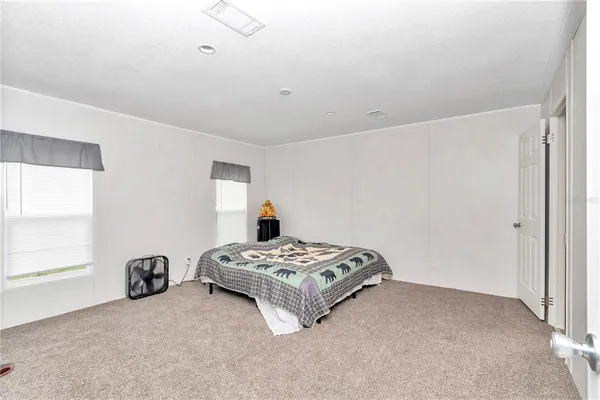 a bathroom with a tub sink and a mirror