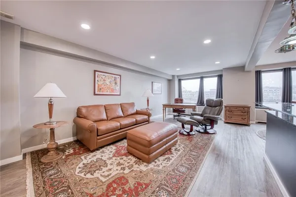 a living room with furniture and a table