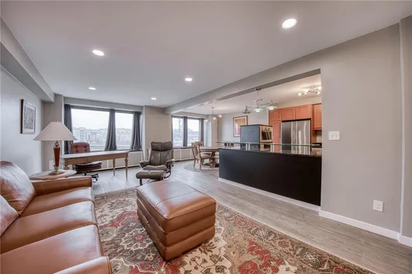 a living room with furniture and a window