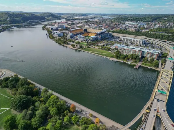 a view of a lake with a city view