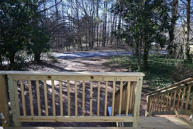 a view of a street with sitting area