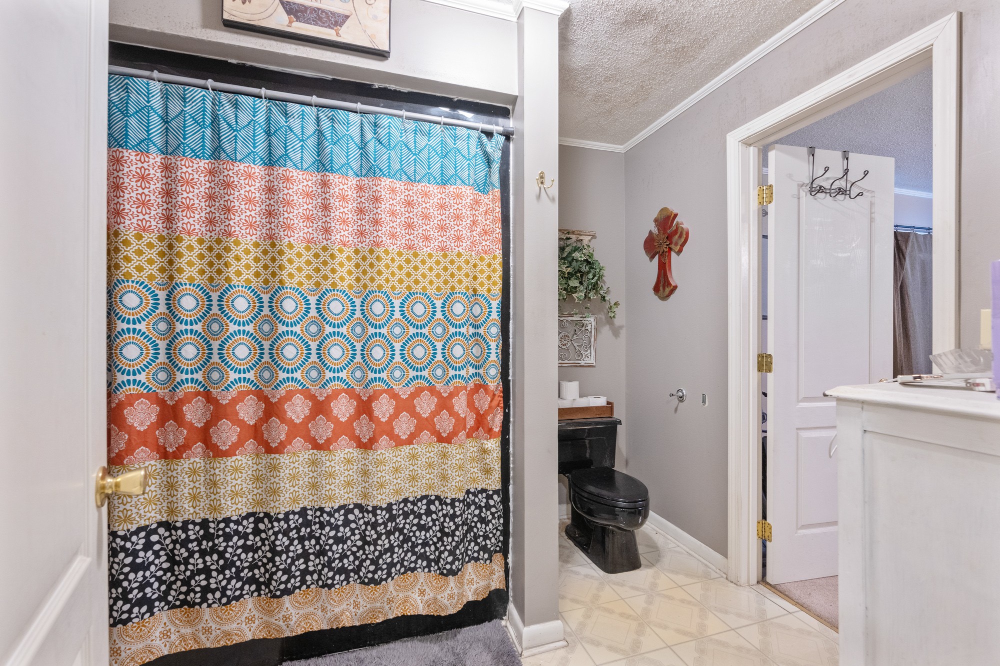 300 Buena Vista Road Huntingdon, TN 38344 - Photo 15 of 23 a bathroom with a sink and a shower curtain