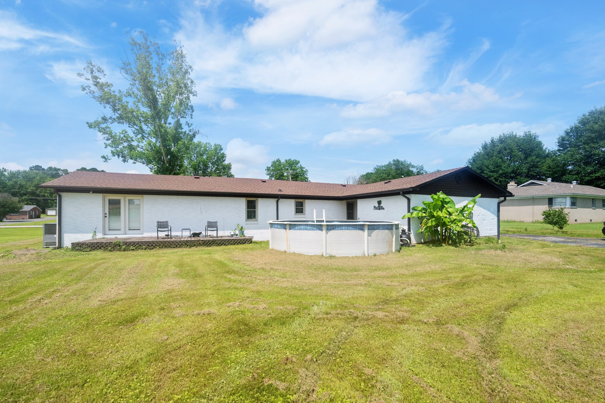 300 Buena Vista Road Huntingdon, TN 38344 - Photo 21 of 23 a view of a house with a yard and a large tree