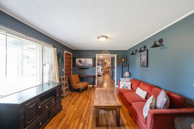 a view of a living room and dining room