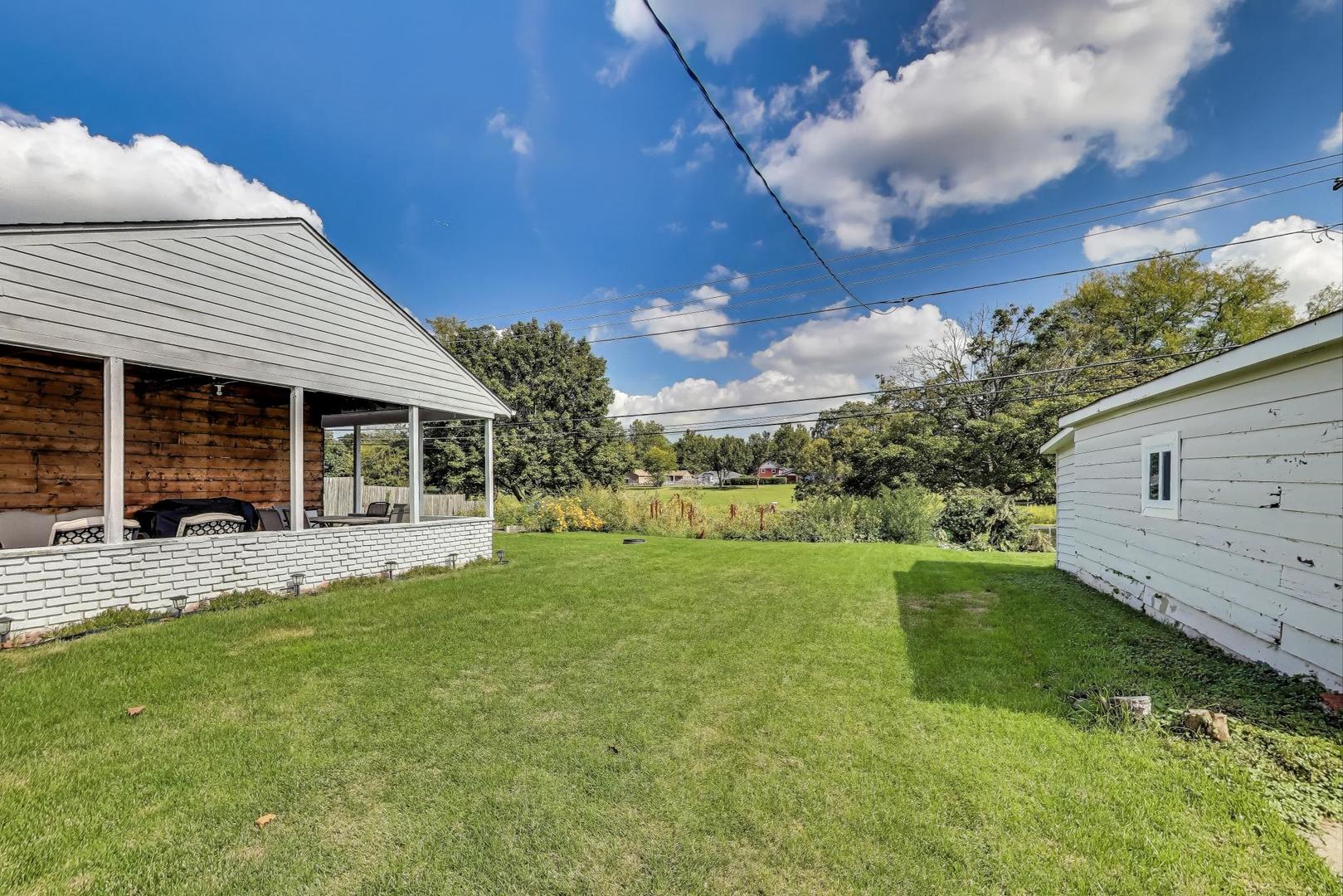 3600 Owl Drive Rolling Meadows, IL 60008 - Photo 15 of 21 a view of a house with a backyard