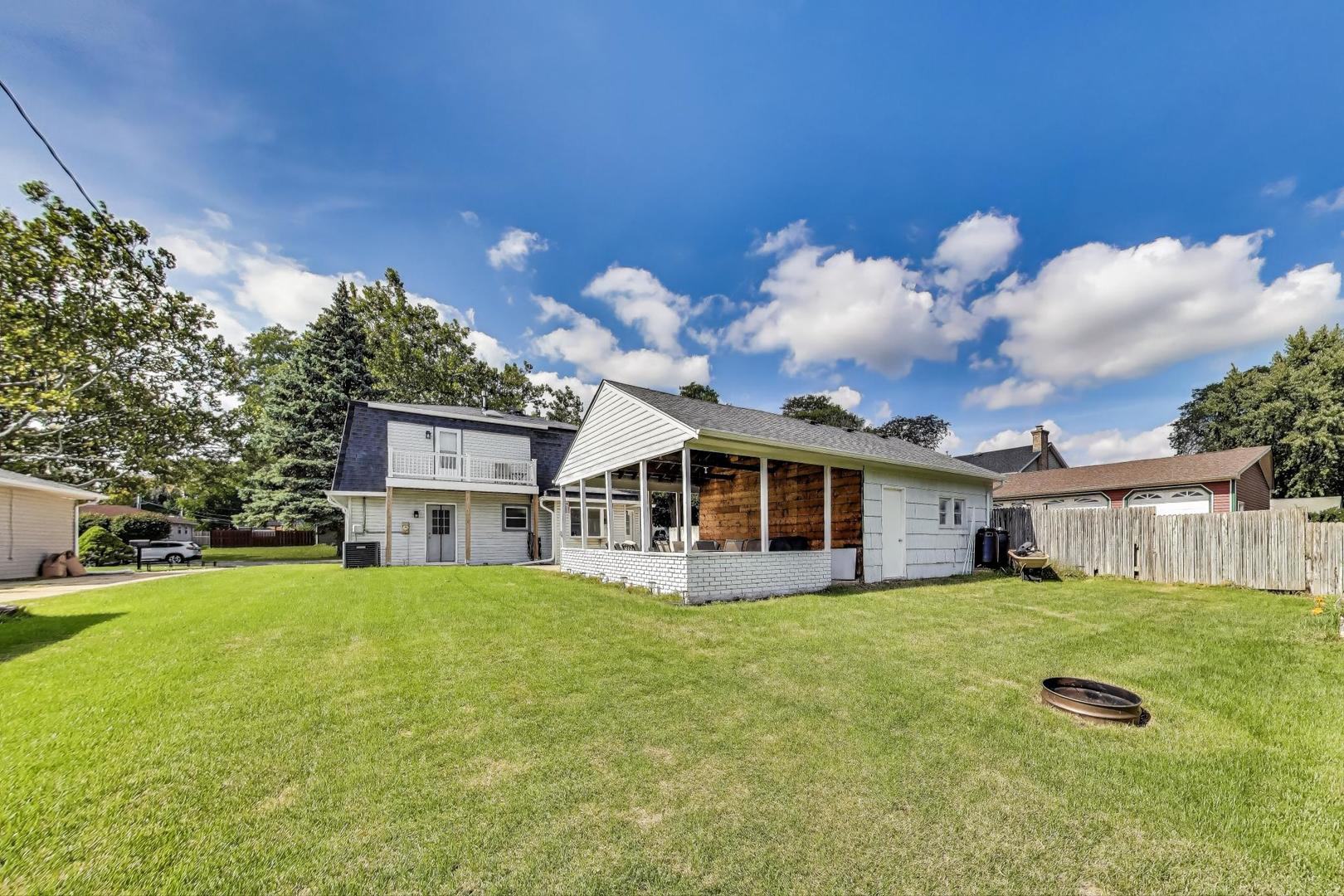 3600 Owl Drive Rolling Meadows, IL 60008 - Photo 17 of 21 a view of a house with a yard