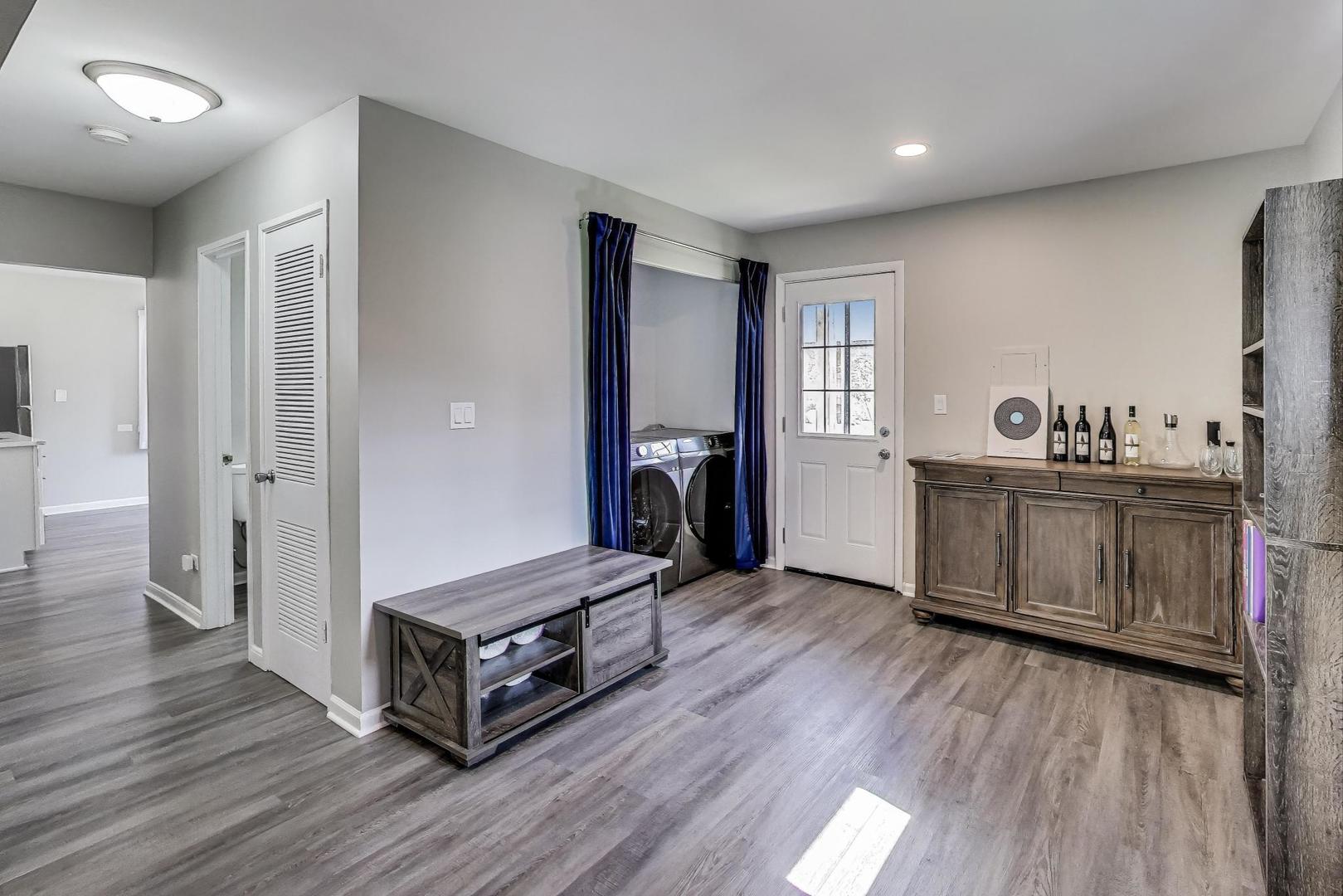 3600 Owl Drive Rolling Meadows, IL 60008 - Photo 4 of 21 a living room with furniture and a fireplace
