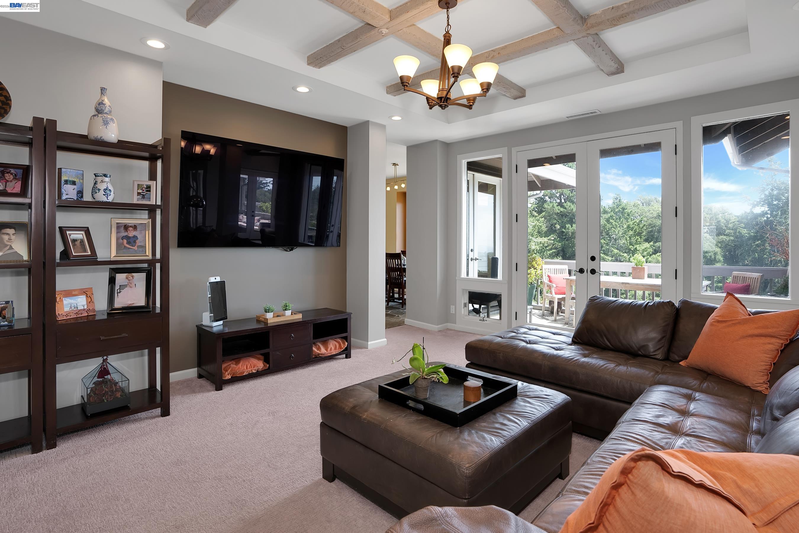 905 Moon Valley Ranch Road Watsonville, CA 95076 - Photo 22 of 60 a living room with furniture ceiling fan and a window