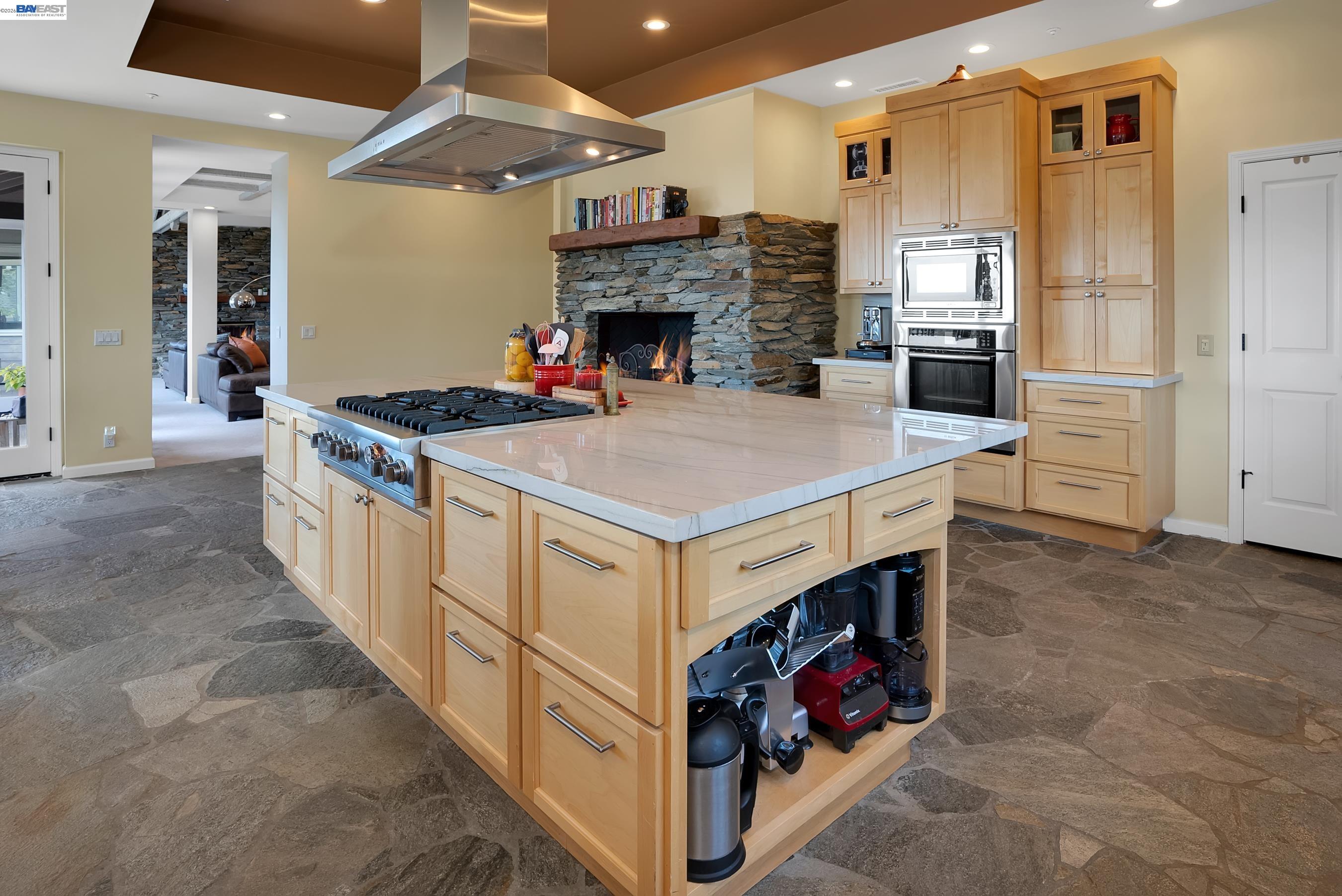 905 Moon Valley Ranch Road Watsonville, CA 95076 - Photo 26 of 60 a kitchen with stainless steel appliances granite countertop a stove and a refrigerator
