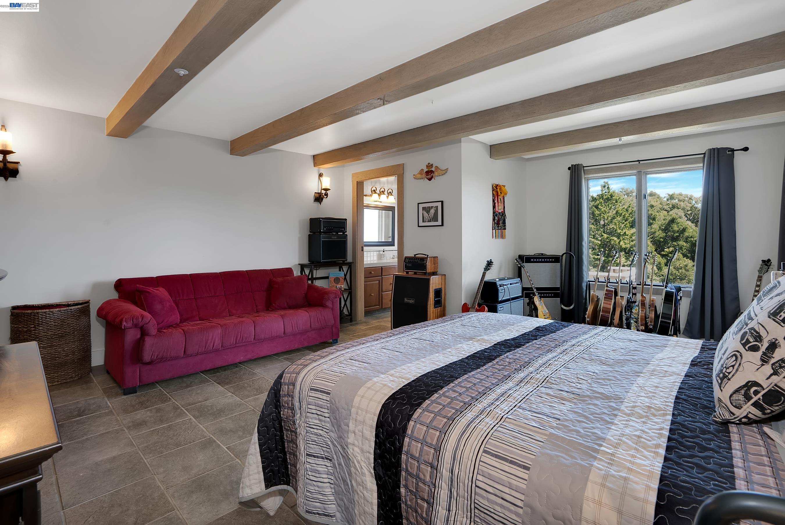 905 Moon Valley Ranch Road Watsonville, CA 95076 - Photo 53 of 60 a bedroom with a bed couch and window