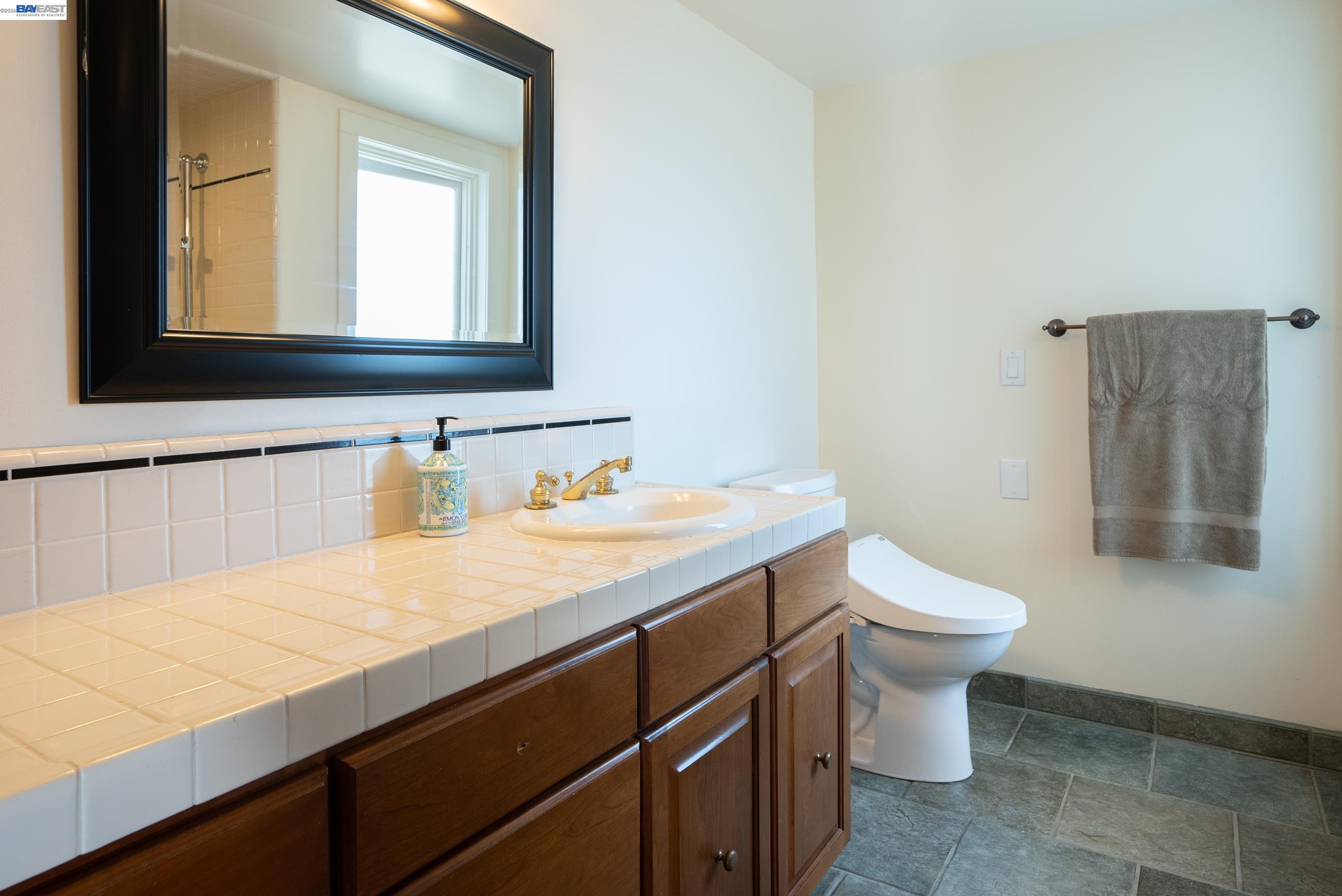 905 Moon Valley Ranch Road Watsonville, CA 95076 - Photo 54 of 60 a bathroom with a sink and a toilet