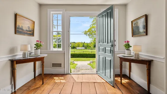 a bedroom with a bed and a fireplace