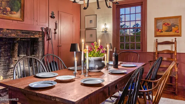 a living room with furniture a rug and a window