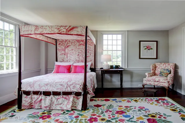 a room with furniture cabinets and a window