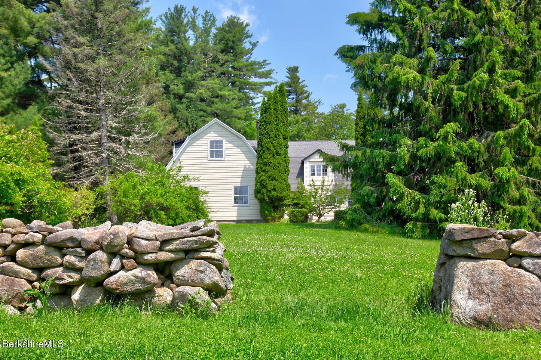 764 East Hill Road New Marlborough, MA 01259 - Photo 56 of 82 a backyard of a house with lots of green space