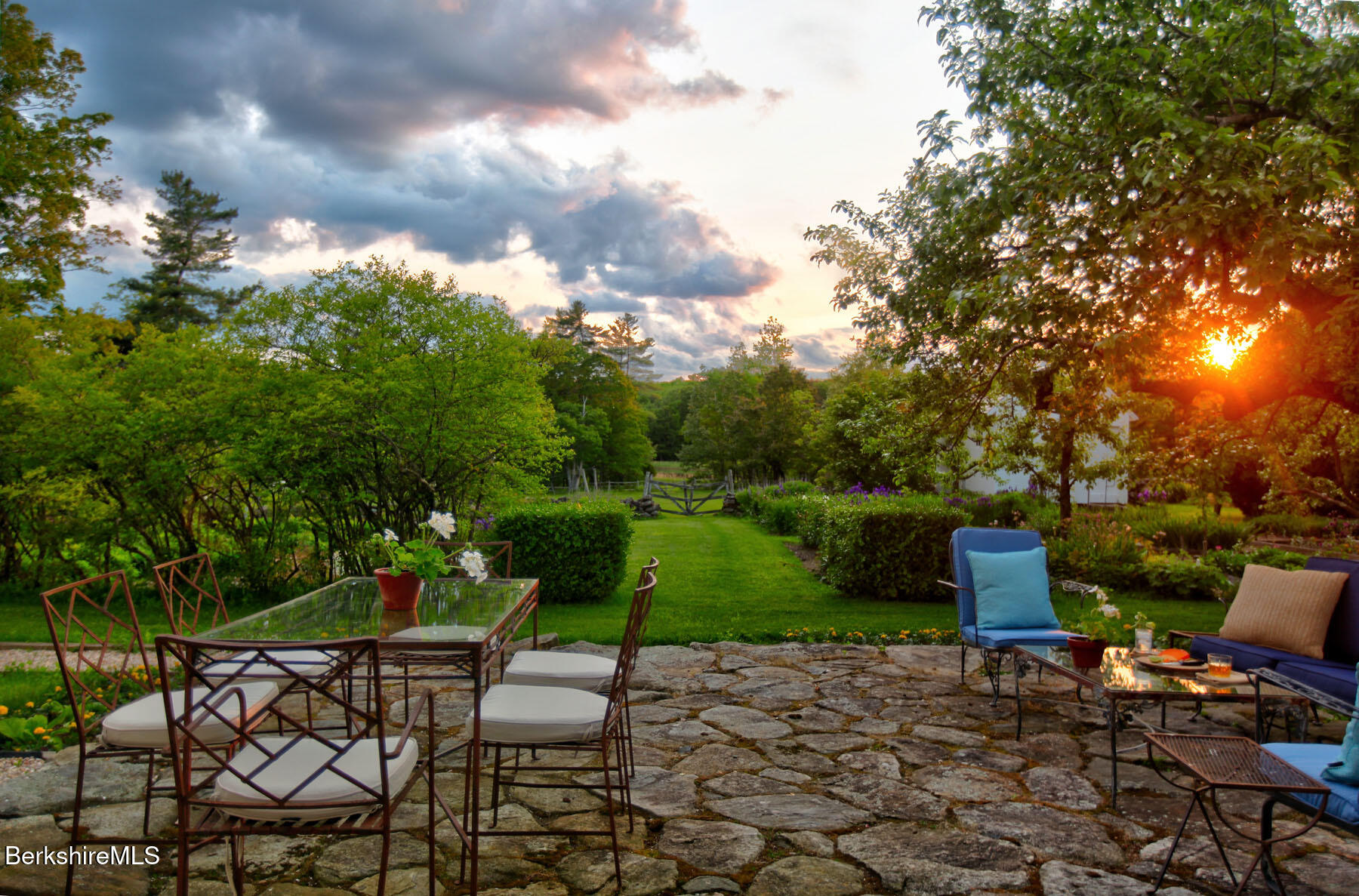 764 East Hill Road New Marlborough, MA 01259 - Photo 71 of 82 a view of a chair and table in the garden