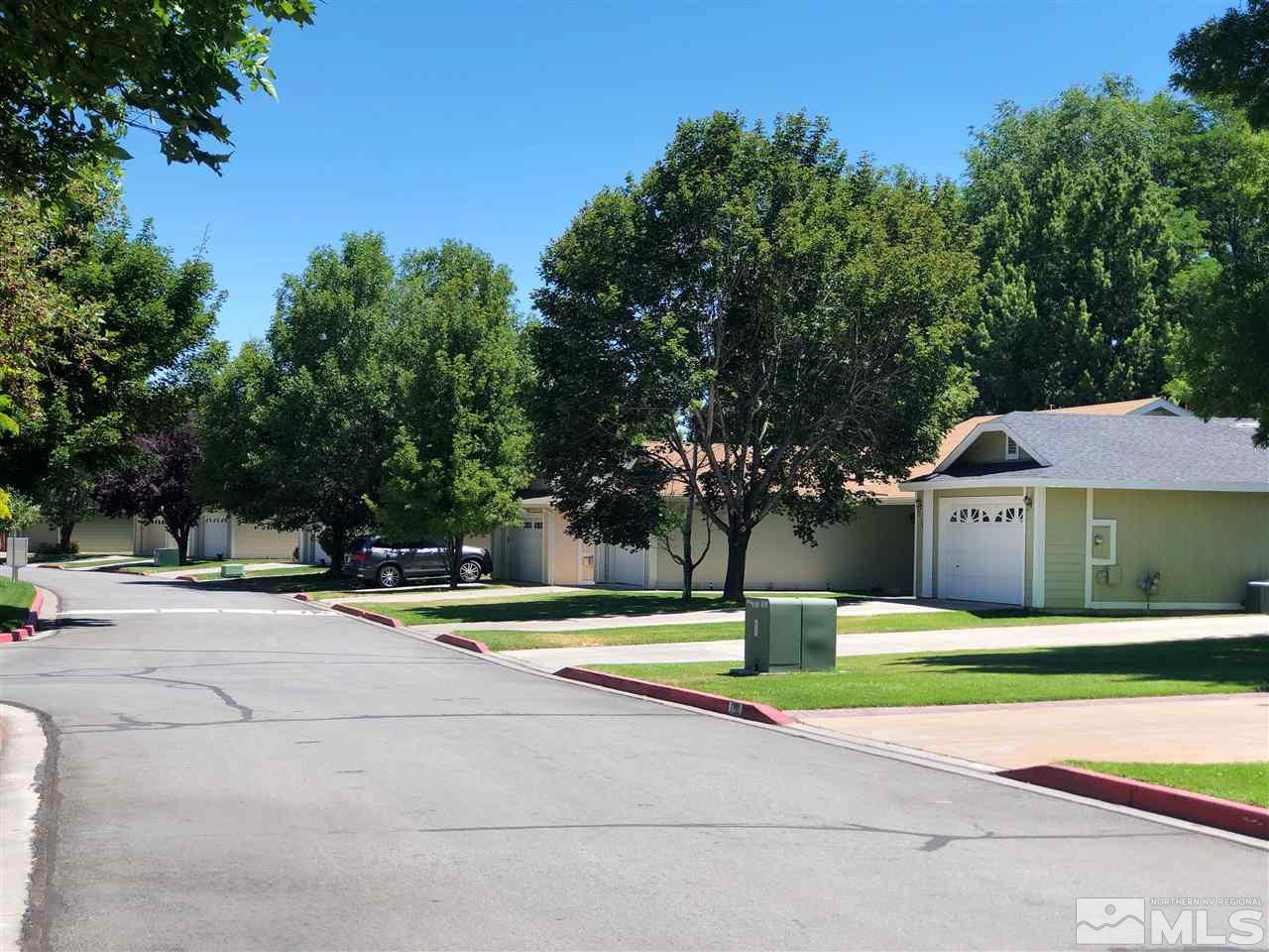7746 Pickering Circle Reno, NV 89511 - Photo 4 of 30 a view of a house with swimming pool and yard