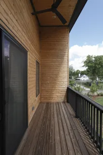 a bathroom with a granite countertop sink mirror and a bathtub