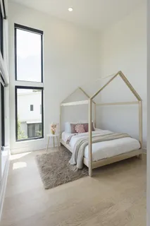 a bathroom with a toilet bathtub and shower