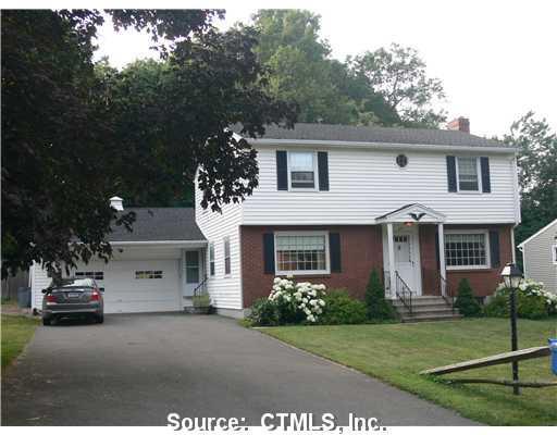 132 Stoddard Road Waterbury, CT 06708 - Photo 1 of 1 a front view of a house with a garden