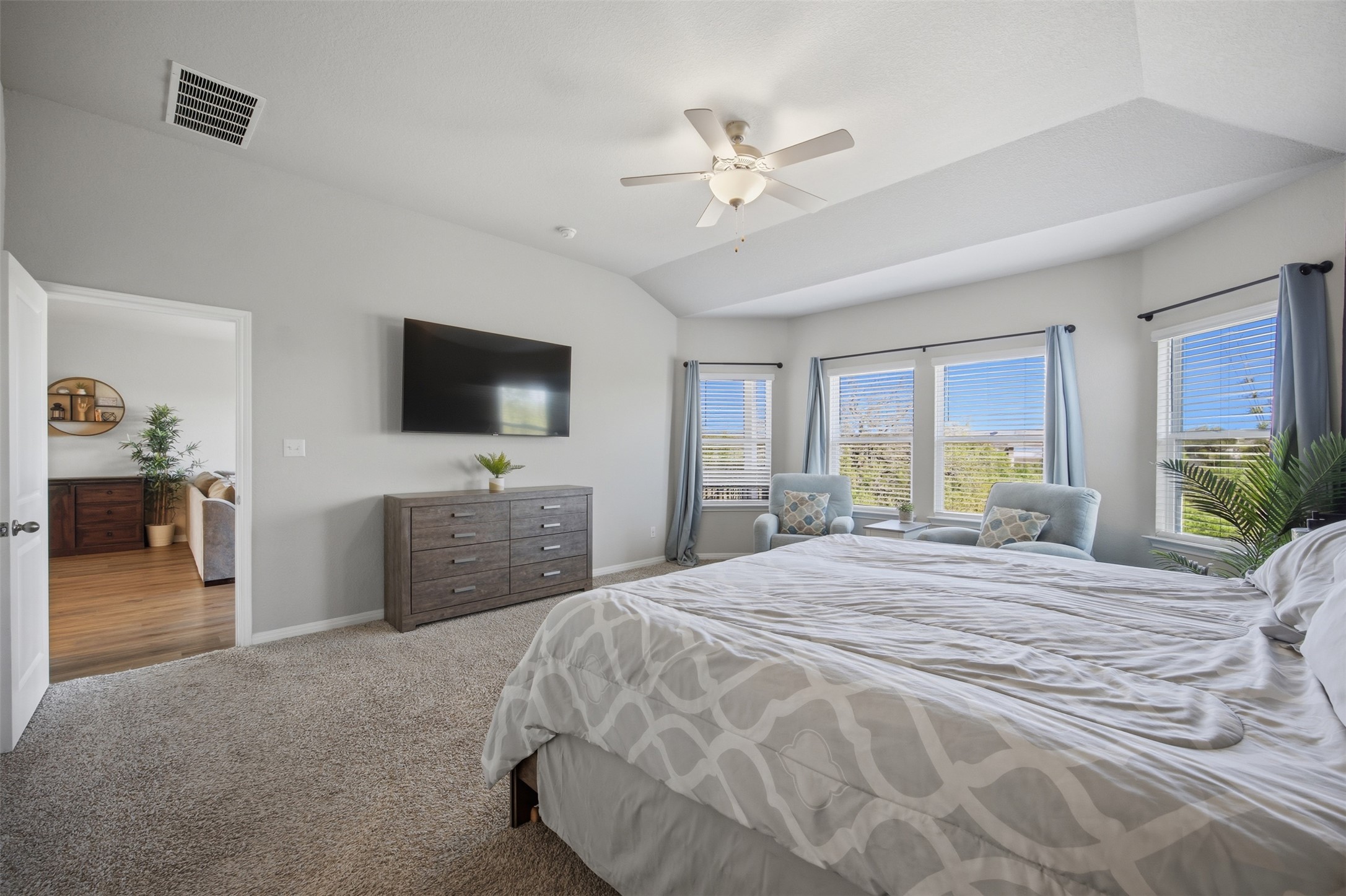 904 View Drive Georgetown, TX 78628 - Photo 14 of 40 a bedroom with a bed and a flat screen tv