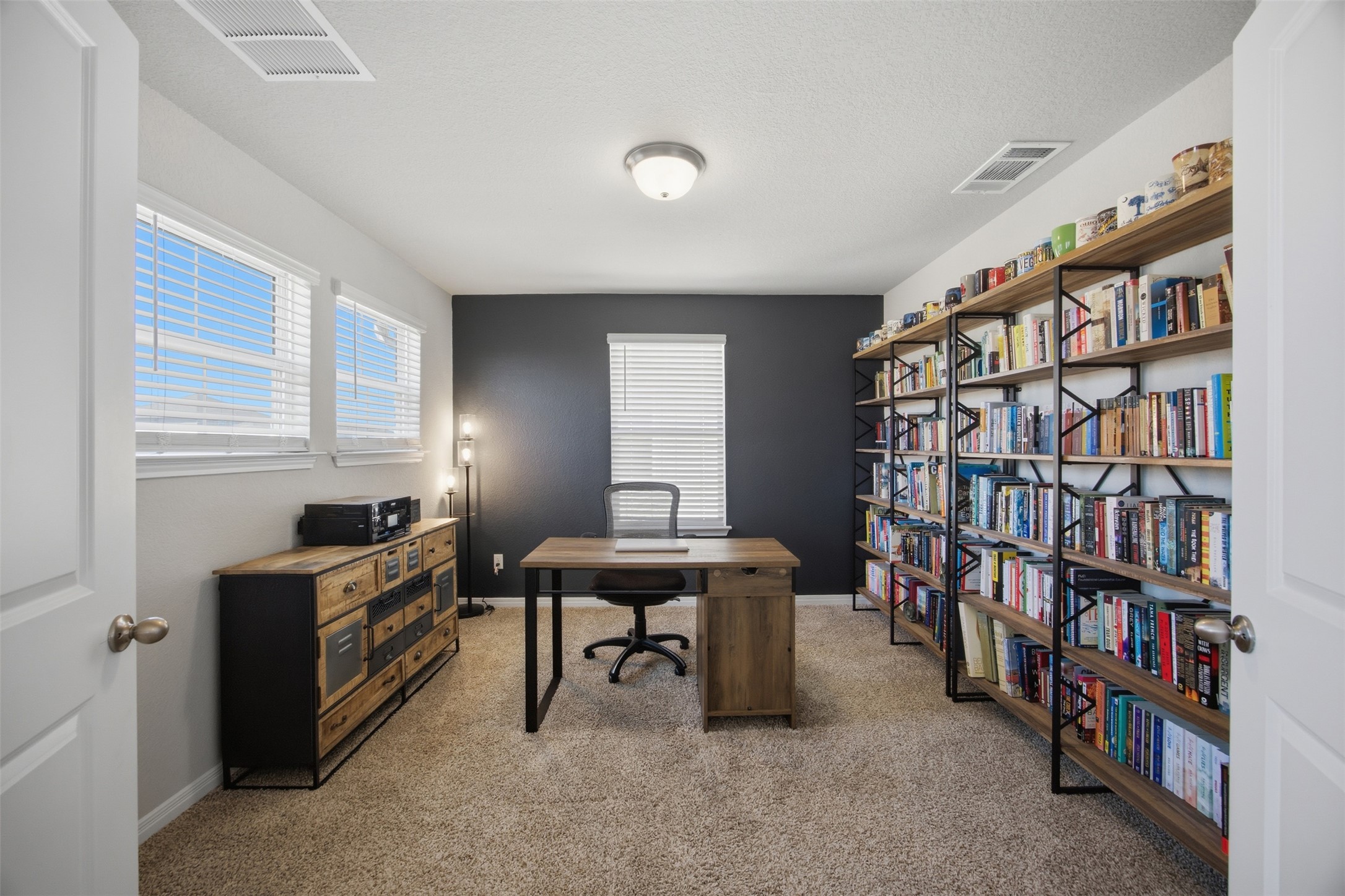 904 View Drive Georgetown, TX 78628 - Photo 24 of 40 a view of a workspace with furniture and toys