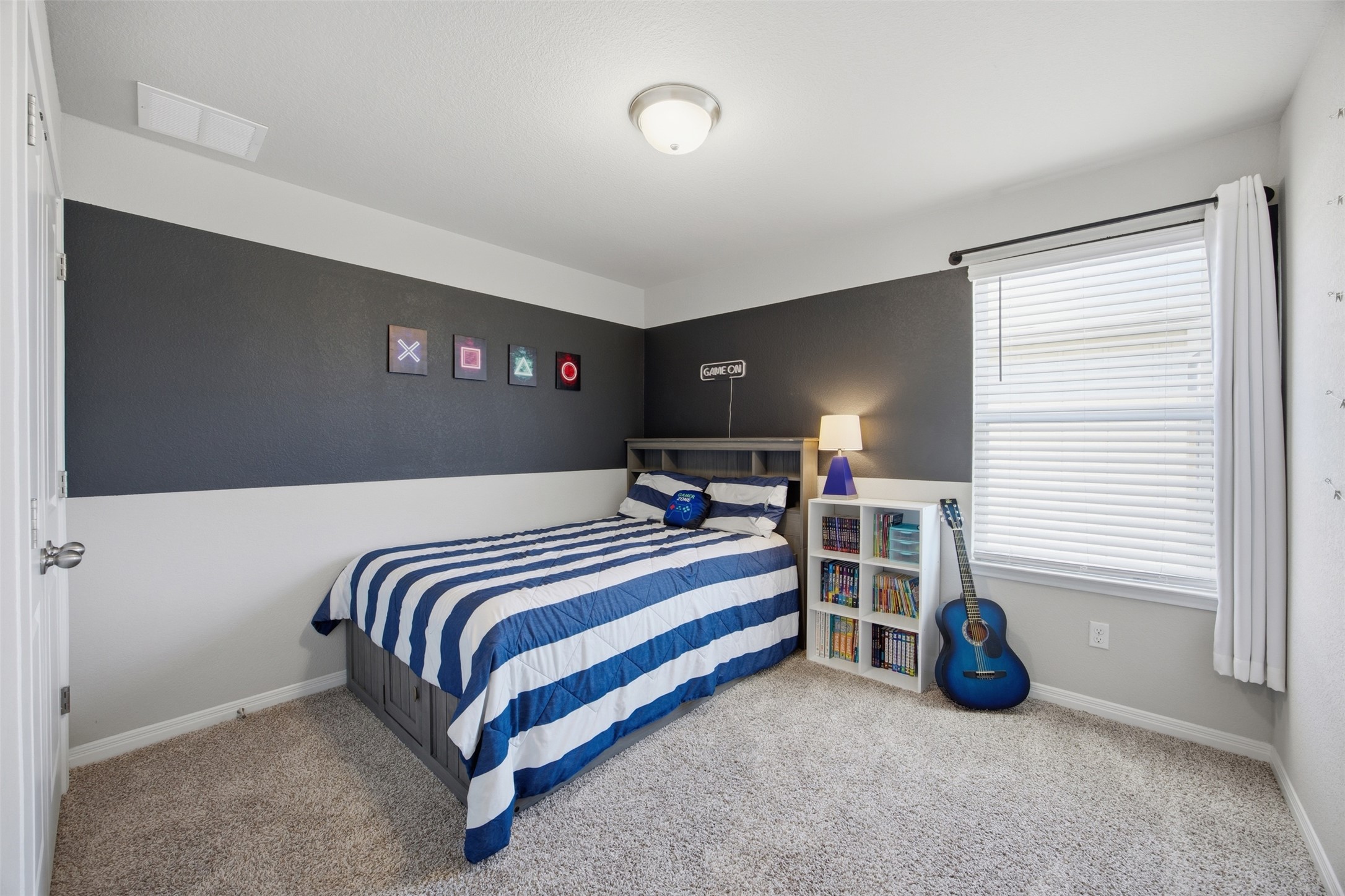 904 View Drive Georgetown, TX 78628 - Photo 25 of 40 a bedroom with bed and a window