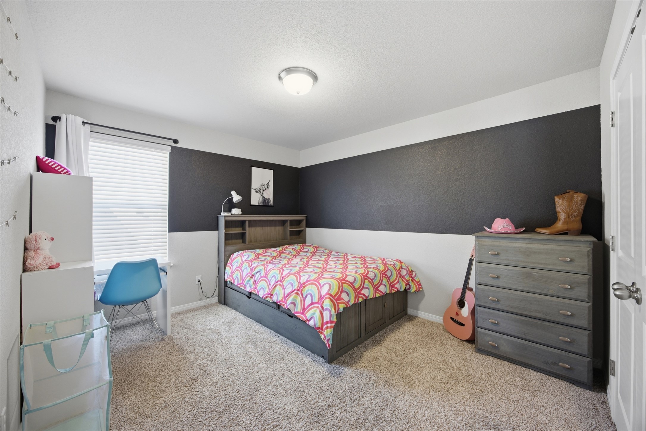 904 View Drive Georgetown, TX 78628 - Photo 26 of 40 a bedroom with a bed and window