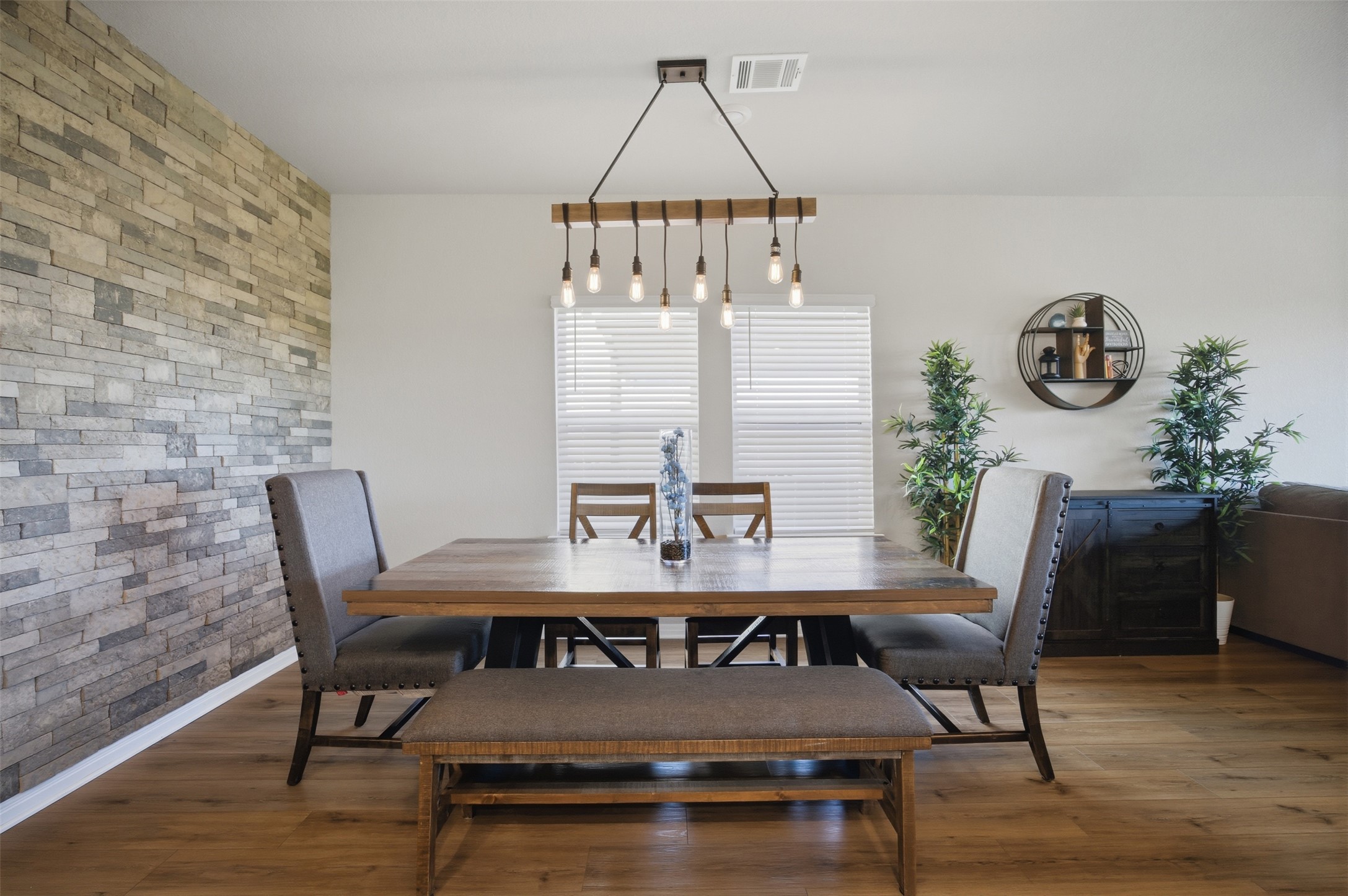 904 View Drive Georgetown, TX 78628 - Photo 6 of 40 a view of a dining room with furniture and wooden floor