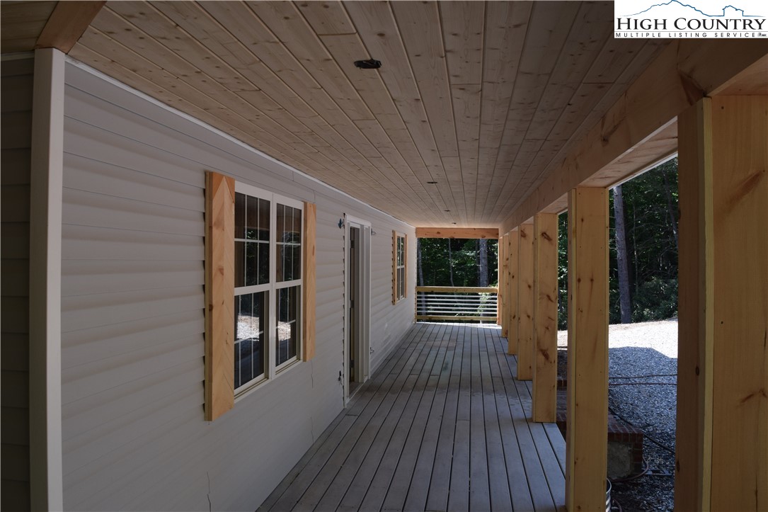 425 Mt Paron Road Deep Gap, NC 28618 - Photo 6 of 6 a view of balcony with wooden floor