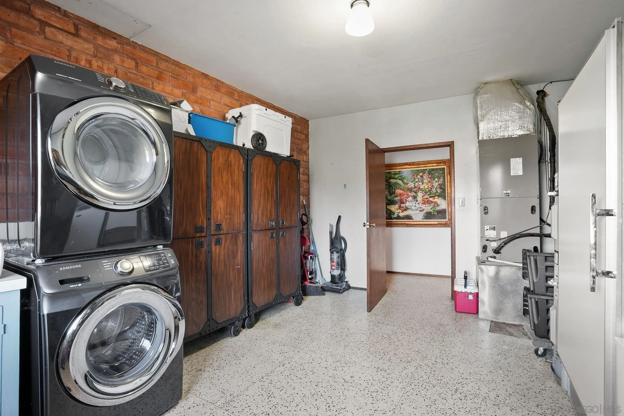 14740 Willow Road Lakeside, CA 92040 - Photo 20 of 37 a view of a storage & utility room with washer and dryer