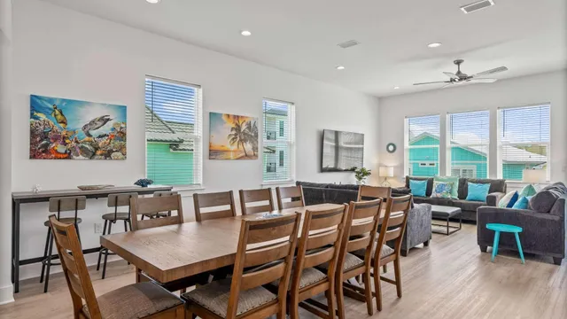 a view of a dining room with furniture window and outside view